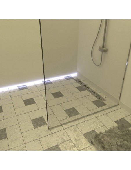 Example of traditional walk-in shower area with glass wall finished with light-colored tiles in white and grey