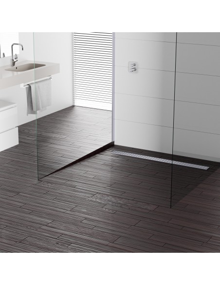 Example of an accessible walk-in shower built on a dark wooden floor and combined with modern shower glass