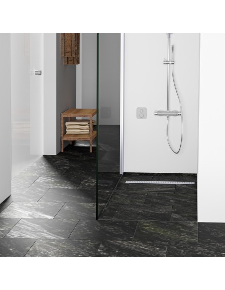 Example of a modern bathroom with open shower finished with offset placed tiles in black marble look