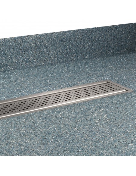 View of a installed wet room tray in blue coloured vinyl flooring with coving, including Sirocco cover