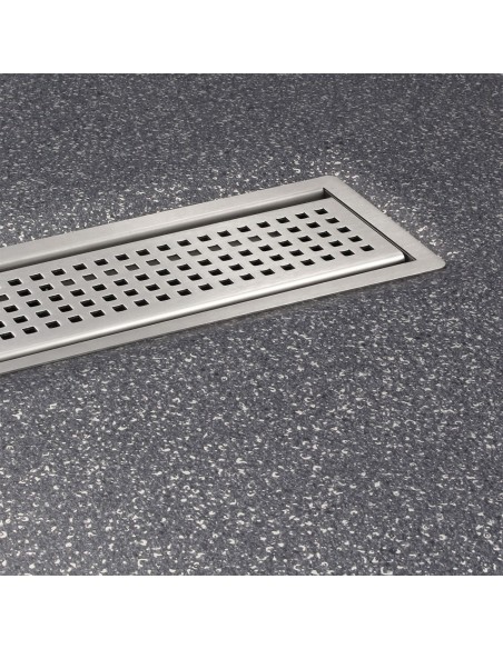 View of a installed wet room tray in dark gray coloured vinyl flooring, including Sirocco cover