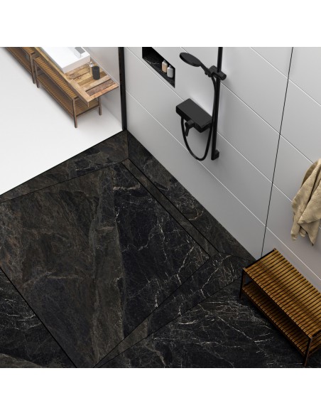 Modern shower area with black marble-look tiles and shower channel and fittings in Black