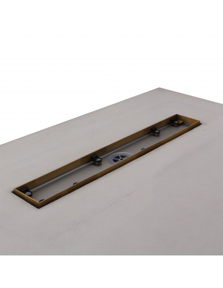 Close up on the drain channel with secondary drainage system and adjustable frame for different tile thicknesses