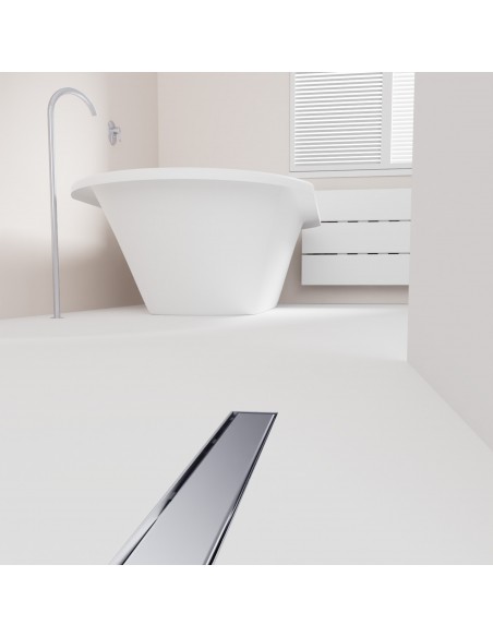 Open bathroom with bathtub and integrated shower drain in Silver in light microcement flooring