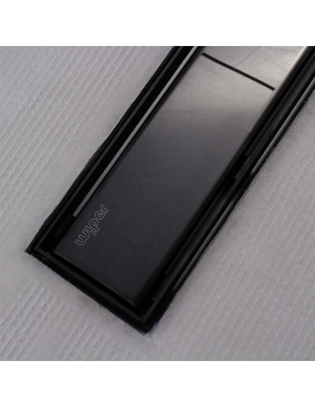 Shower tray with integrated Black linear drain and matching elegant cover Ponente