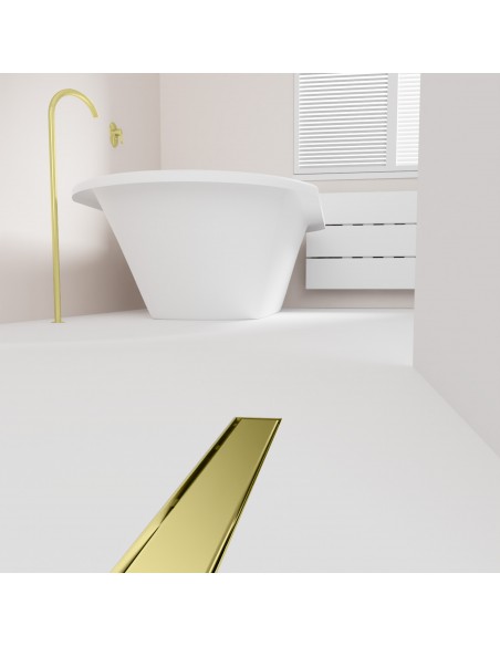 Open bathroom with bathtub and integrated shower drain in Gold in light microcement flooring