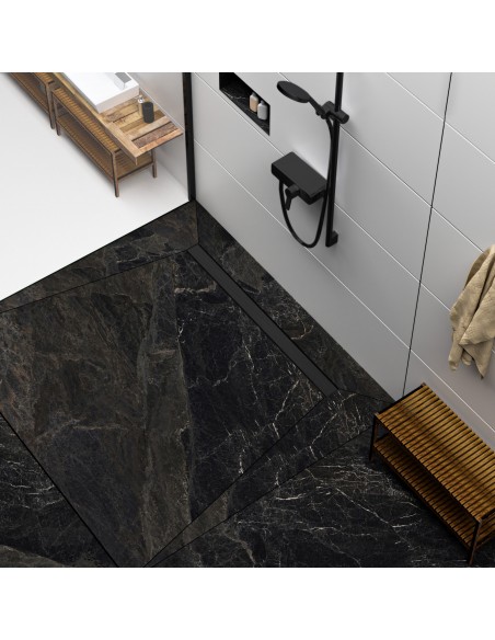 Modern shower area with black marble-look tiles and shower channel and fittings in Black - solid cover side