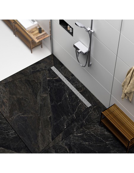 Modern shower area with black marble-look tiles and shower channel and fittings in Silver