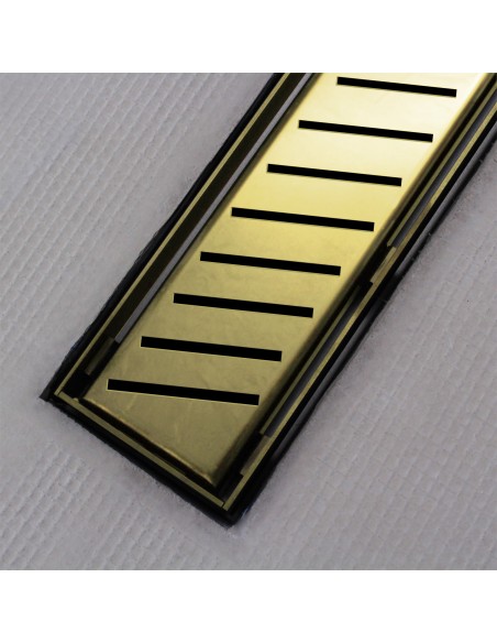 Shower tray with integrated Gold linear drain and matching elegant cover Zonda