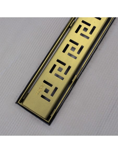 Shower tray with integrated Gold linear drain and matching elegant cover Tivano