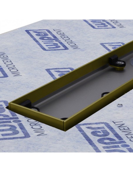 Close up on the drain channel with secondary drainage system and adjustable frame for different tile thicknesses