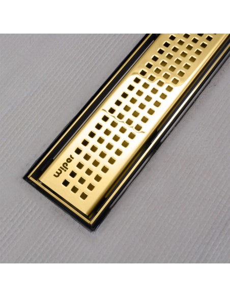Shower tray with integrated Brass linear drain and matching elegant cover Sirocco