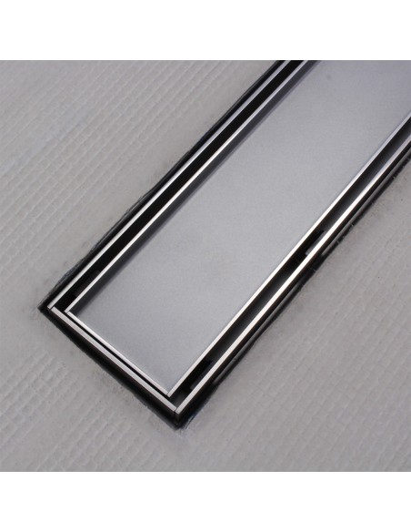 Highly precised integrated linear channel with non-visible flushed steel flange for maximalized sealing