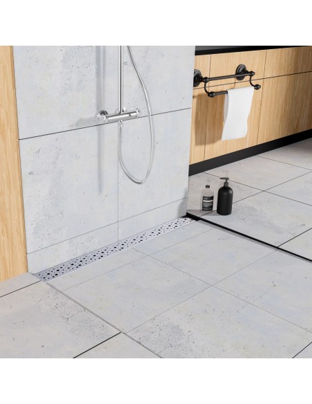 Example of classic shower area with wall-installed channel on large-format tiles with wooden elements in the bathroom