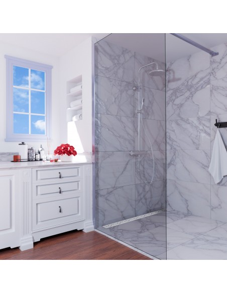 Example of elegant, light-colored shower area in marble look, combined with minimalistic linear drain on the wall