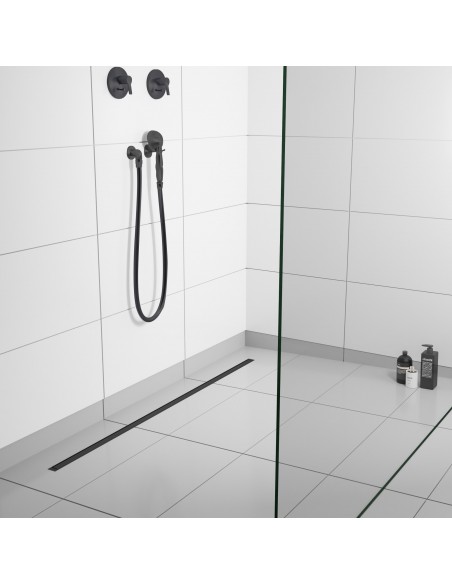 Example of a light-colored shower area with large-format tiles and INTENSI 316 linear channel in Graphite
