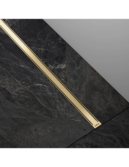 Example of a built-in slim and modern looking INTENSI 316 linear drain in Brass in black marble floor