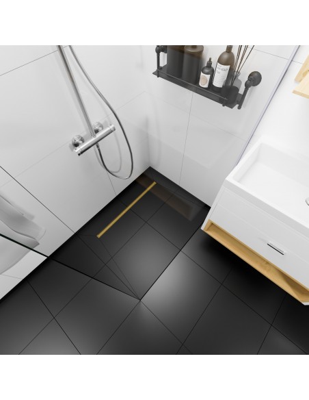 Example: View from above on a black and white shower area featuring INTENSI 316 linear channel in Brass