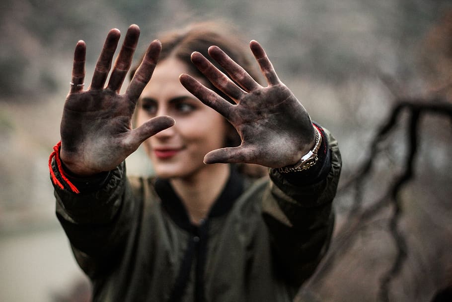 Woman With Dirty Hands